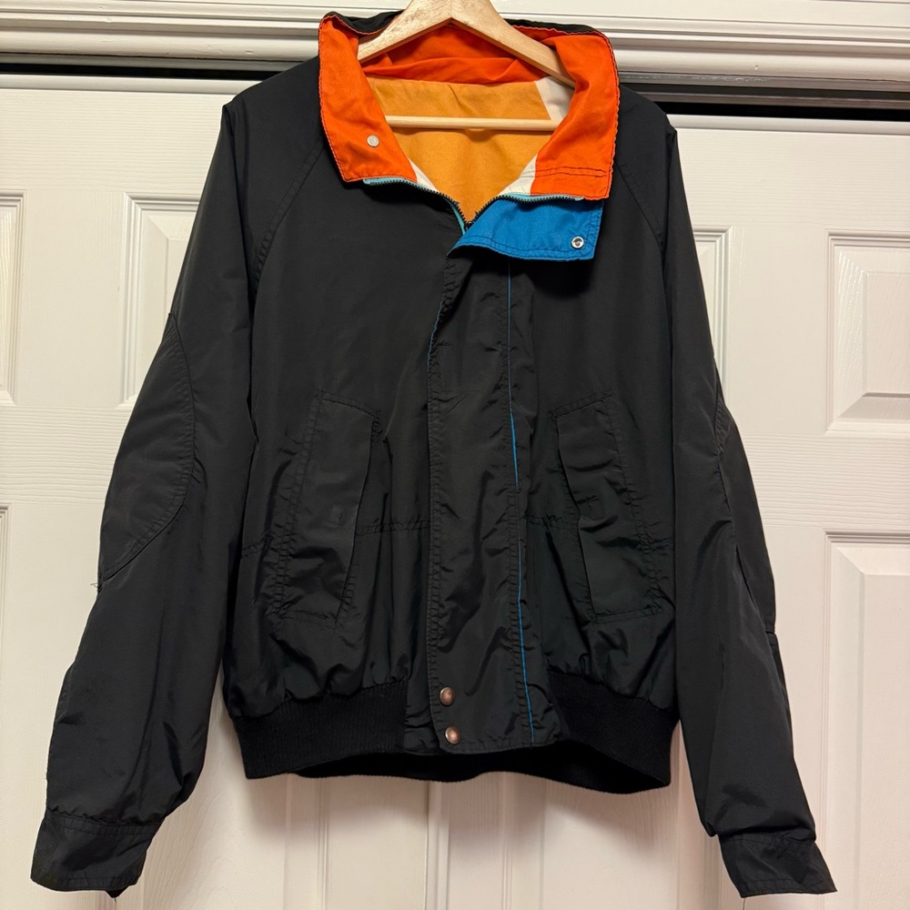 SOLD
VTG 1992 Joe Camel Black and Orange Men's Bomber Jacket